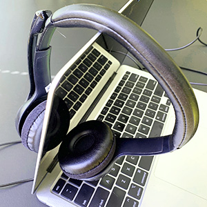 headphones on laptop