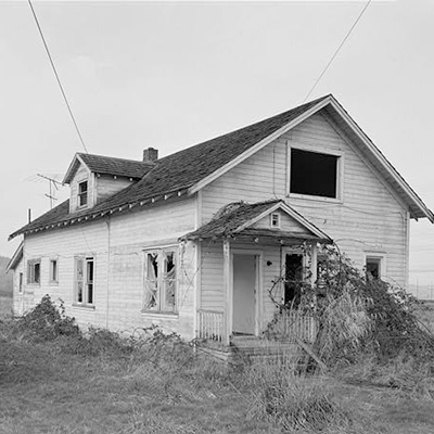 Image of house with broken windows