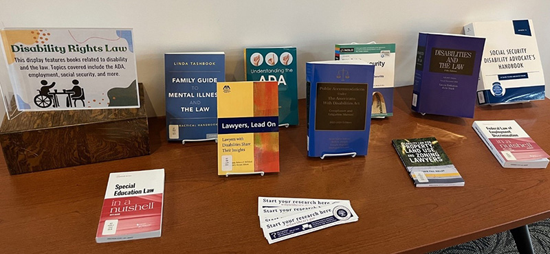 book display in library with the titles listed in article